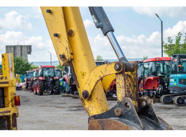 Buldoexcavator New Holland 115  de vanzare